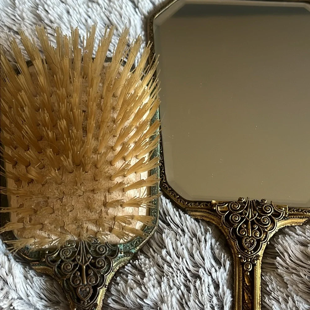 Antique mirror and brush set. Velvet with floral embordery design on back.